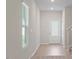 Bright entryway with hardwood floors and a view of the staircase at 94 Taverners Ln, Angier, NC 27501