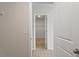 Hallway featuring carpet and multiple doors at 94 Taverners Ln, Angier, NC 27501