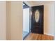 Entryway featuring a front door with oval-glass and hardwood floors at 944 Athens Dr, Raleigh, NC 27606