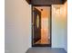 Inviting front entryway featuring a decorative oval-glass front door at 944 Athens Dr, Raleigh, NC 27606