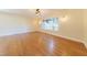 Spacious living room with hardwood floors and natural light at 944 Athens Dr, Raleigh, NC 27606