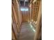 Bathroom under construction with exposed wood frame and plumbing for a tub at 95 Bald Cypress Ln, Youngsville, NC 27596