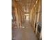 Unfinished interior with exposed framing and duct work ready for customization at 95 Bald Cypress Ln, Youngsville, NC 27596