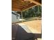 Under construction patio area overlooking treed backyard at 95 Bald Cypress Ln, Youngsville, NC 27596