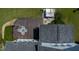 Aerial shot of a large deck with a spa overlooking the backyard and roof at 9701 Corktree Ct, Wake Forest, NC 27587