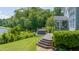 Backyard deck with hot tub and screened porch near the lake at 9701 Corktree Ct, Wake Forest, NC 27587