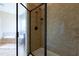 Modern bathroom featuring a shower with glass enclosure and a separate soaking tub in a well-lit area at 9701 Corktree Ct, Wake Forest, NC 27587
