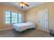 Bedroom featuring a bed with white linens, natural light, and a ceiling fan at 9701 Corktree Ct, Wake Forest, NC 27587