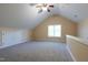 Bonus room with vaulted ceiling, recessed lighting, and a large window at 9701 Corktree Ct, Wake Forest, NC 27587