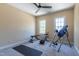 Exercise room with stationary bike, weights, and workout mat with good lighting at 9701 Corktree Ct, Wake Forest, NC 27587