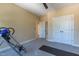 Spacious exercise room with a fan and exercise equipment on neutral-colored carpet at 9701 Corktree Ct, Wake Forest, NC 27587