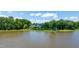 The home is nestled along the tranquil waterfront, providing serene views and a peaceful atmosphere at 9701 Corktree Ct, Wake Forest, NC 27587