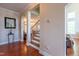 A grand foyer welcomes you with gleaming hardwood floors and elegant archways at 9701 Corktree Ct, Wake Forest, NC 27587