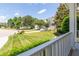 Lush front yard with a well-maintained lawn and manicured landscaping at 9701 Corktree Ct, Wake Forest, NC 27587