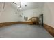 Spacious garage featuring new paint and a stairway at 9701 Corktree Ct, Wake Forest, NC 27587
