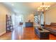 Elegant living room featuring hardwood floors, recessed lighting, and an open floor plan at 9701 Corktree Ct, Wake Forest, NC 27587