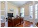 Charming home office with hardwood floors, wainscotting, and lots of natural light at 9701 Corktree Ct, Wake Forest, NC 27587