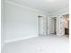 This spacious bedroom features neutral carpet and access to the ensuite bathroom at 0 Bluestone Ct # 22 R, Chapel Hill, NC 27514
