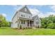 Beautiful home features a manicured lawn and an attractive exterior color scheme, enhancing its curb appeal at 0 Bluestone Ct # 22 R, Chapel Hill, NC 27514