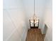 Grand foyer with soaring ceilings, paneled walls, a chandelier, and hardwood floors at 0 Bluestone Ct # 22 R, Chapel Hill, NC 27514