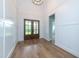 Bright foyer showcasing a chandelier, wood floors, and white paneled walls at 0 Bluestone Ct # 22 R, Chapel Hill, NC 27514