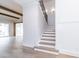 Open-concept living space features wooden beams, hardwood floors, and access to the outdoors at 0 Bluestone Ct # 22 R, Chapel Hill, NC 27514