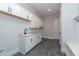 Mud room with cabinets, tile flooring, granite countertops and a bench at 0 Bluestone Ct # 22 R, Chapel Hill, NC 27514