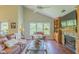 Comfortable living room with vaulted ceiling, fireplace, and large windows overlooking nature at 0317 Glen Echo Ln # C, Cary, NC 27518