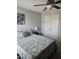 Bedroom features a ceiling fan and a closet with double doors, providing ample storage at 109 E Webber Lane Ln, Clayton, NC 27527