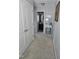 Hallway leading to bedrooms and a bathroom with stylish decor and ample closet space at 109 E Webber Lane Ln, Clayton, NC 27527