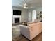 Cozy living room features a fireplace, plush sectional sofa, and neutral color palette for a relaxed atmosphere at 109 E Webber Lane Ln, Clayton, NC 27527