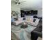 Spacious living room open to the kitchen, featuring a comfortable sectional and stylish decor at 109 E Webber Lane Ln, Clayton, NC 27527