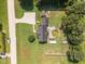 Aerial view of home featuring a pool, basketball court, long driveway, and fenced yard at 111 Marshay Meadow Rd, Youngsville, NC 27596