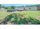 Large backyard boasts an above-ground pool, deck, and patio area for outdoor enjoyment at 111 Marshay Meadow Rd, Youngsville, NC 27596