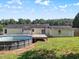 Open backyard featuring an above-ground pool and well-maintained lawn at 111 Marshay Meadow Rd, Youngsville, NC 27596