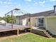 Spacious backyard with deck, gazebo, and house with yellow siding at 111 Marshay Meadow Rd, Youngsville, NC 27596
