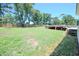Large backyard with deck and partial pergola at 111 Marshay Meadow Rd, Youngsville, NC 27596