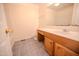 Modest bathroom with single sink vanity and tile floors at 111 Marshay Meadow Rd, Youngsville, NC 27596