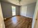 Cozy bedroom with hardwood floors and a built in closet at 111 Marshay Meadow Rd, Youngsville, NC 27596