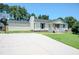 Wide driveway leading to a charming home with a basketball hoop and well-kept lawn at 111 Marshay Meadow Rd, Youngsville, NC 27596