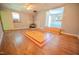 Living room showcases a fireplace and open access to the kitchen at 111 Marshay Meadow Rd, Youngsville, NC 27596