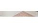 Tan carpet up close, white baseboard and door frame at 1137 Amber Shadow Dr, Durham, NC 27703