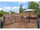Community dog park with shade and play structures providing a dedicated space for pet recreation and socialization at 1137 Amber Shadow Dr, Durham, NC 27703