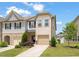 Charming townhome with a well-maintained lawn and attached one-car garage at 1137 Amber Shadow Dr, Durham, NC 27703