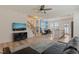 Open-concept living space with a modern staircase and eat-in kitchen at 1137 Amber Shadow Dr, Durham, NC 27703