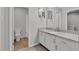 Bathroom featuring granite counters, double sinks, and a separate toilet and shower area at 117 Scott Ln, Chapel Hill, NC 27514