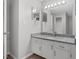 Neutral bathroom with granite counter, new vanity and updated lighting at 117 Scott Ln, Chapel Hill, NC 27514