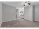 Neutral bedroom with attached bathroom and closet provides ample storage at 117 Scott Ln, Chapel Hill, NC 27514