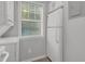 View of the kitchen appliances and cabinets near a sunny window at 117 Scott Ln, Chapel Hill, NC 27514