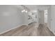 Large open-concept living room featuring updated floors and gray paint at 117 Scott Ln, Chapel Hill, NC 27514